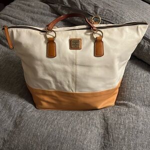 Dooney and Bourke Y2K tote in cream and brown leather.